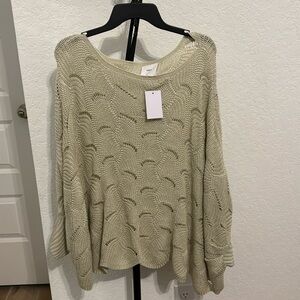 Lola sage green sweater is oversized and comfy!